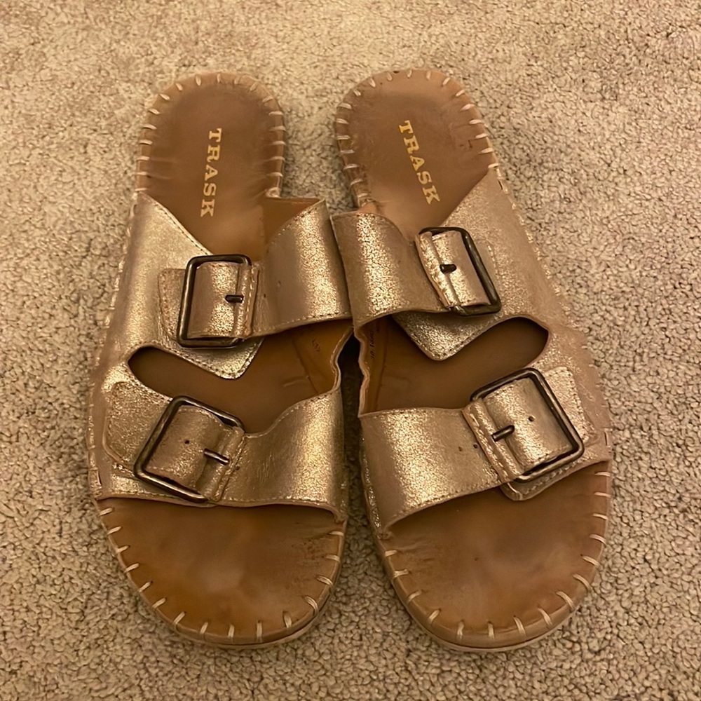 Trask gold and brown buckle up slides.